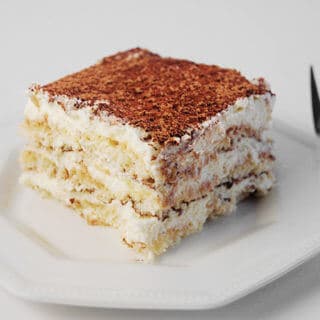 A slice of Italian Tiramisu on a plate.