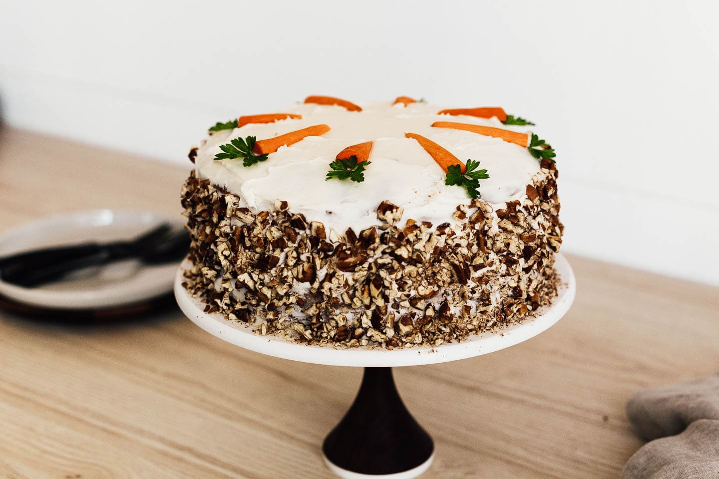 Carrot Cake on a cake stand.