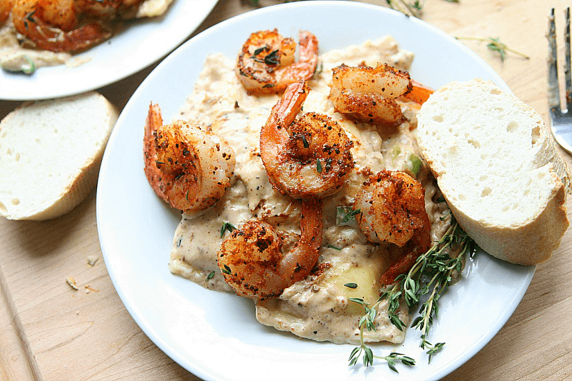 Balckened Shrimp and Cheese Ravioli with a side of french bread.