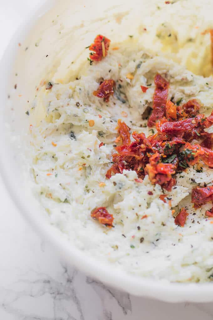 A mixing bowl with dip ingredients.