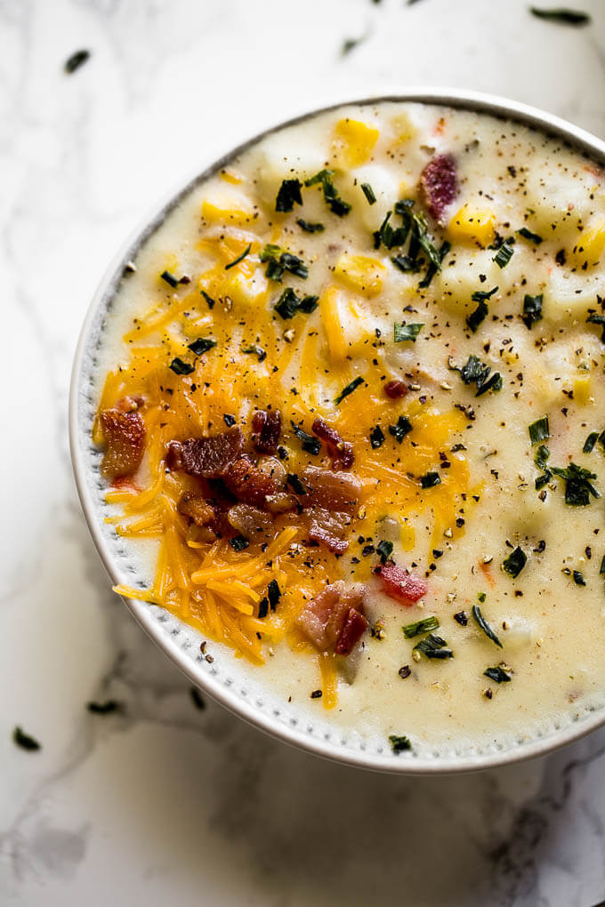 Instant Pot Corn Chowder in a bowl with bacon.