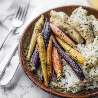 Roasted Multi Colored Carrots are the perfect side dish for dinner. They only take 20 minutes in the oven.