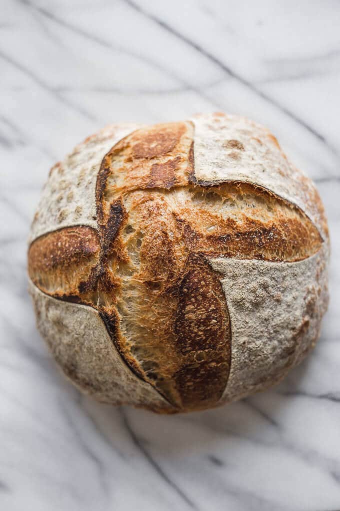 A baked loaf of sourdough bread.