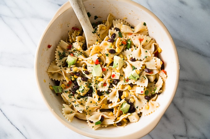 Southwest Pasta Salad with wooden spoon.