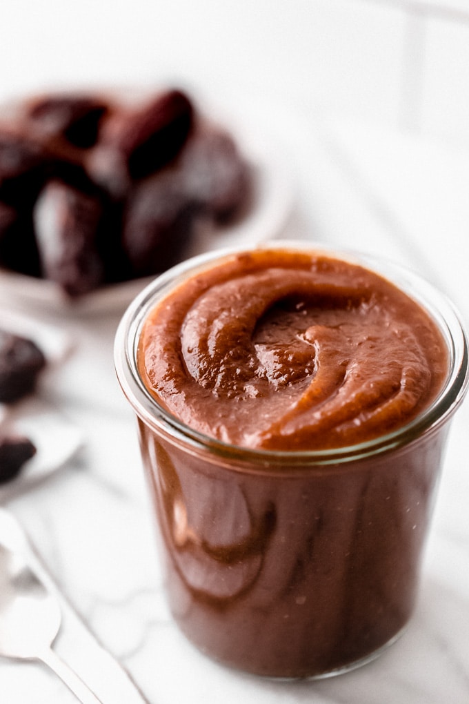 Date paste in a glass jar.