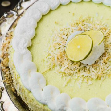 key lime cheesecake on a serving platter
