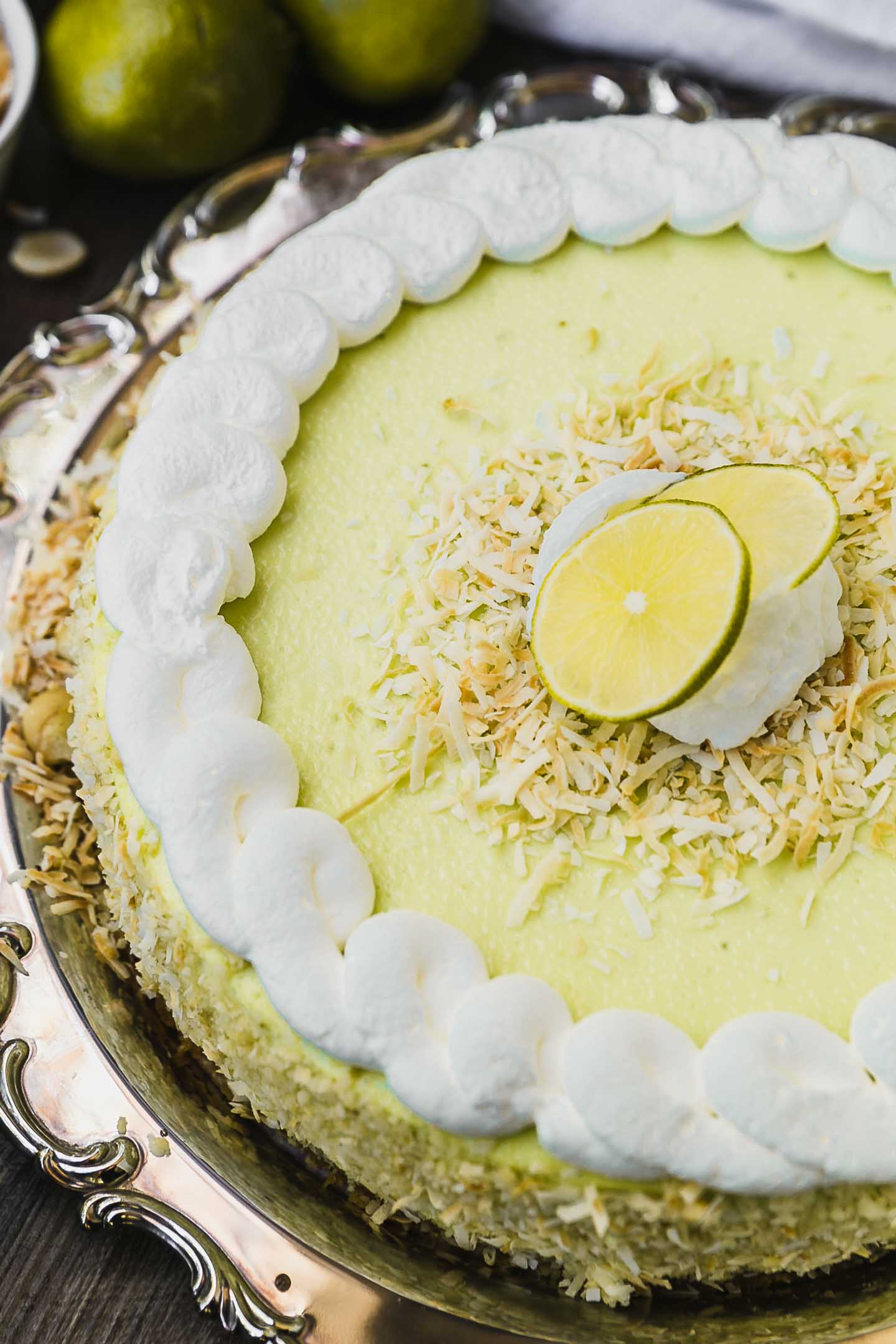 key lime cheesecake on a serving platter.