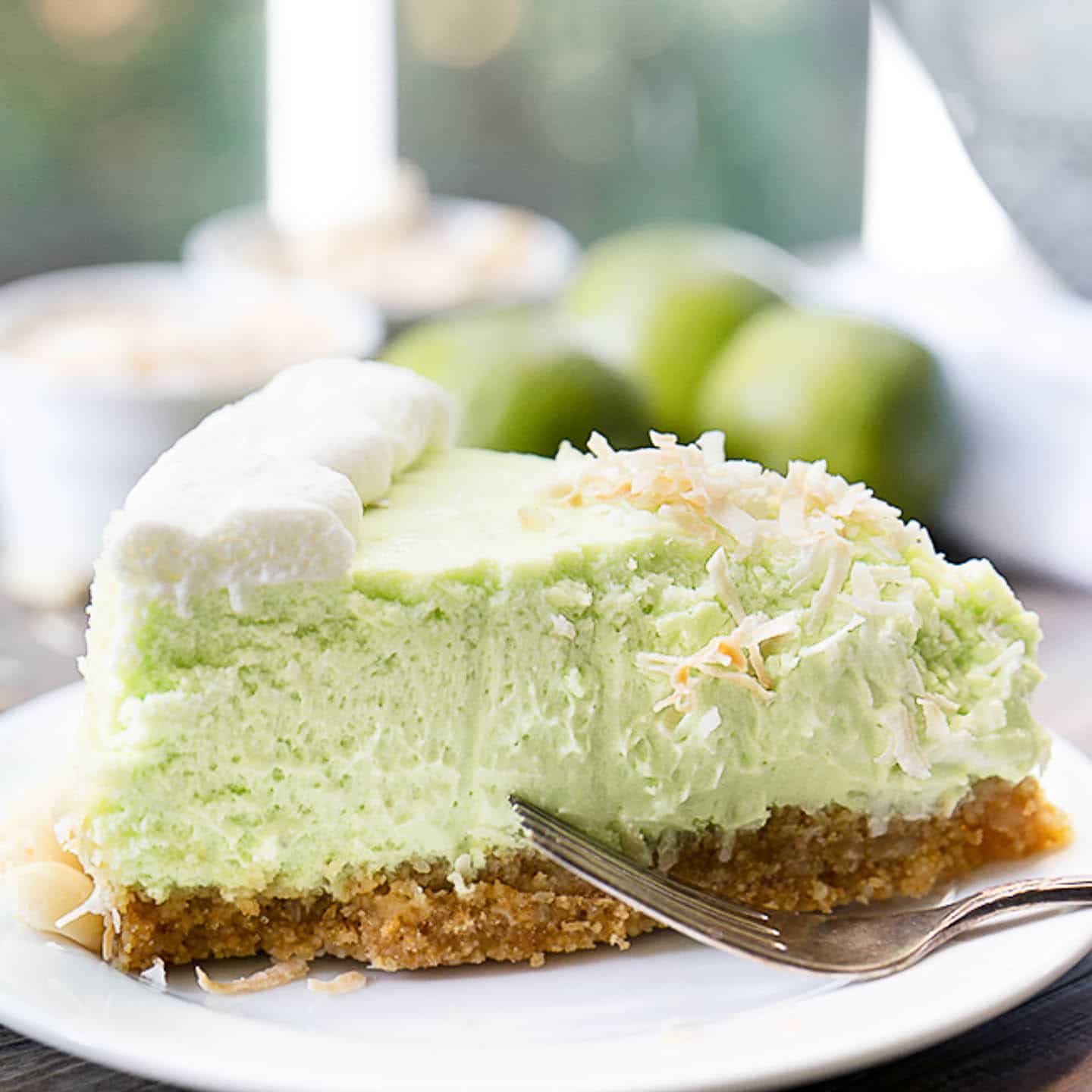 slice of key lime cheesecake on a plate