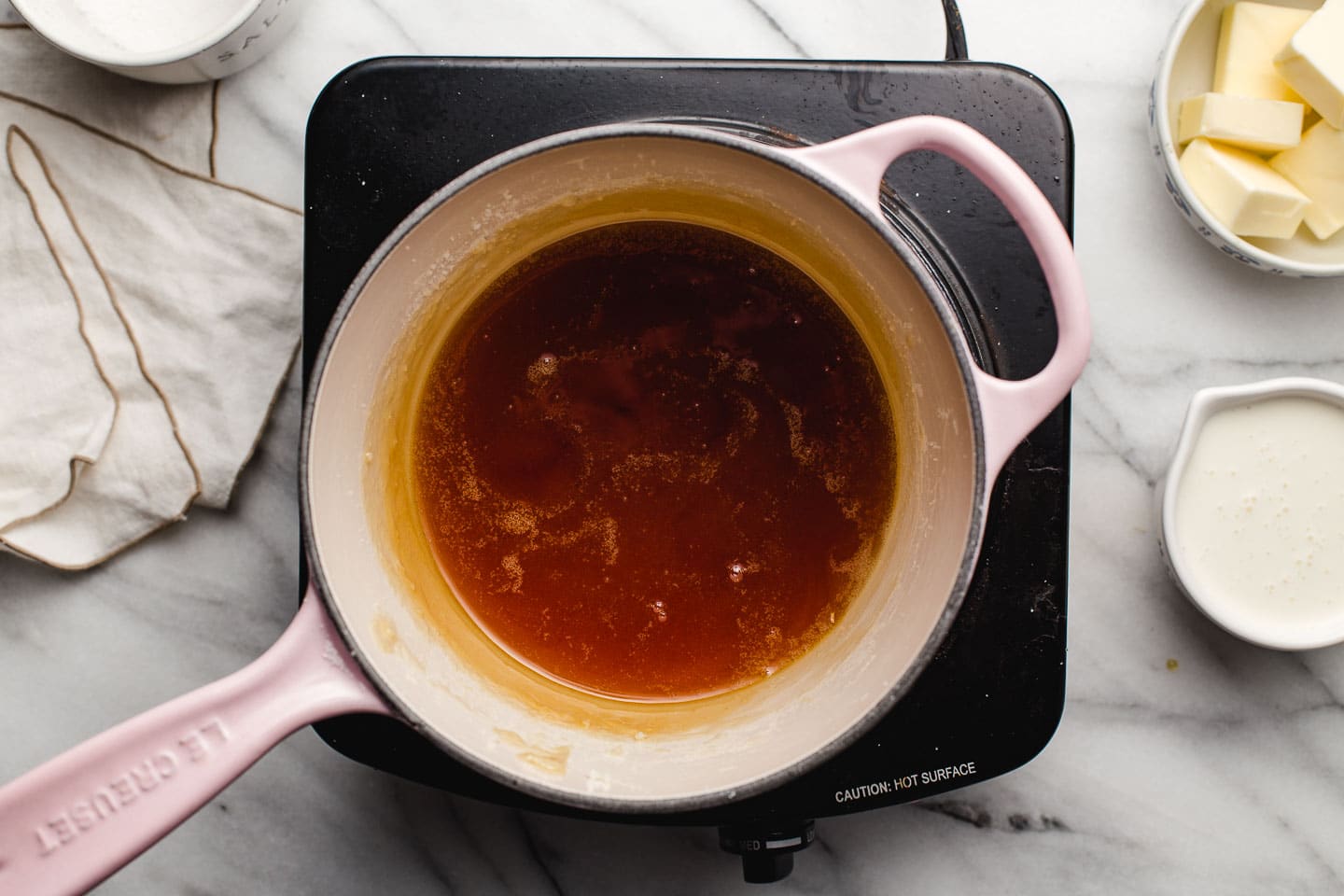 Sugar browning in a saucepan.