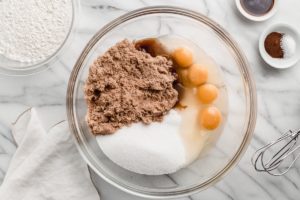 Bowl with sugar and eggs.