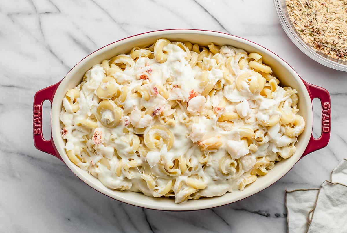 Lobster mac and cheese in a casserole dish.