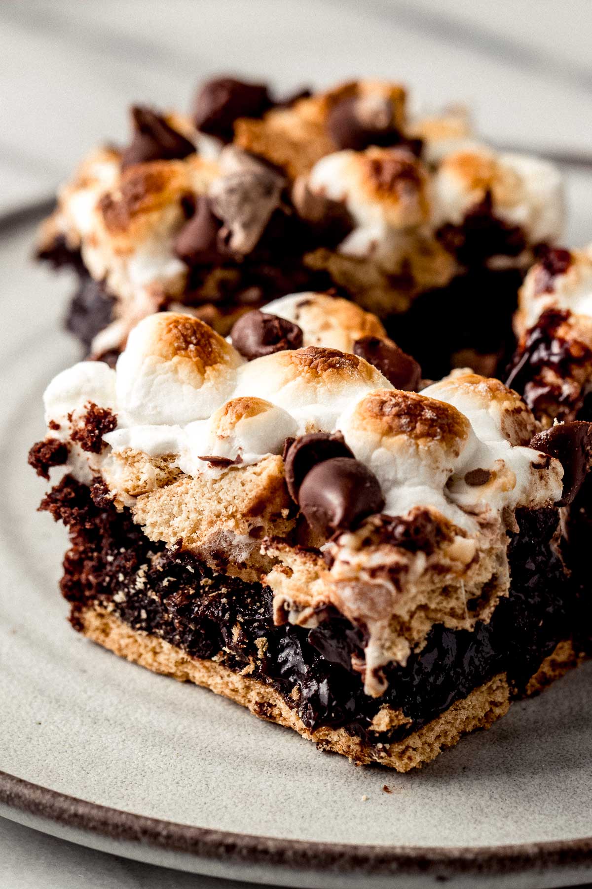 Baked smores browinies on a plate.