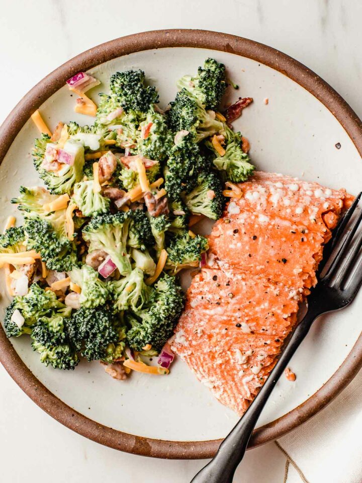 Baked salmon with broccoli salad on the side.