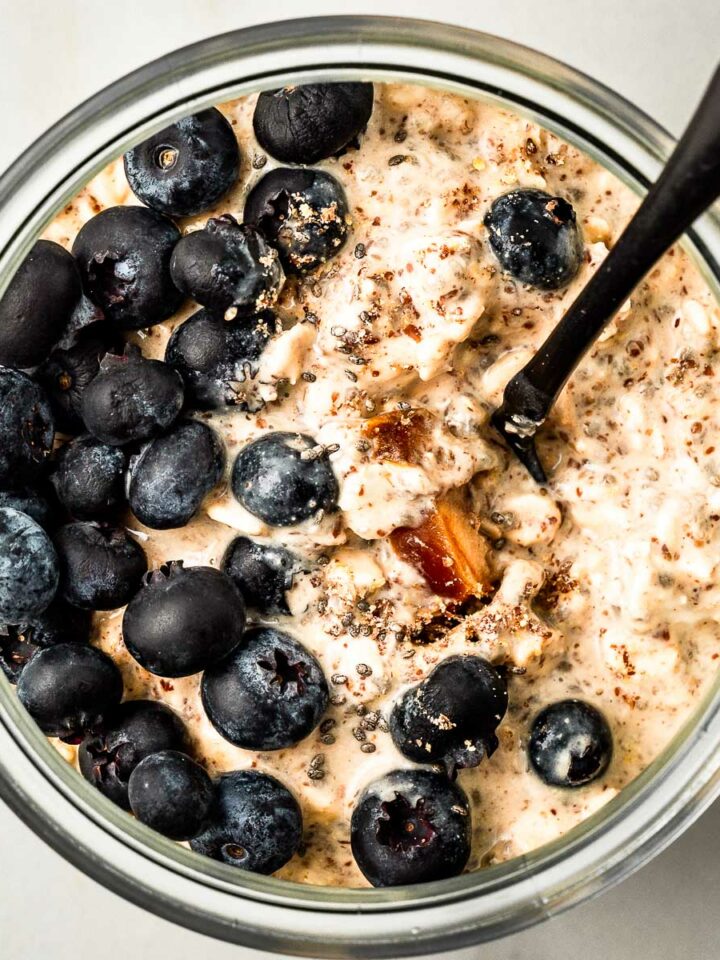 Overnight oats in a jar with blueberries.