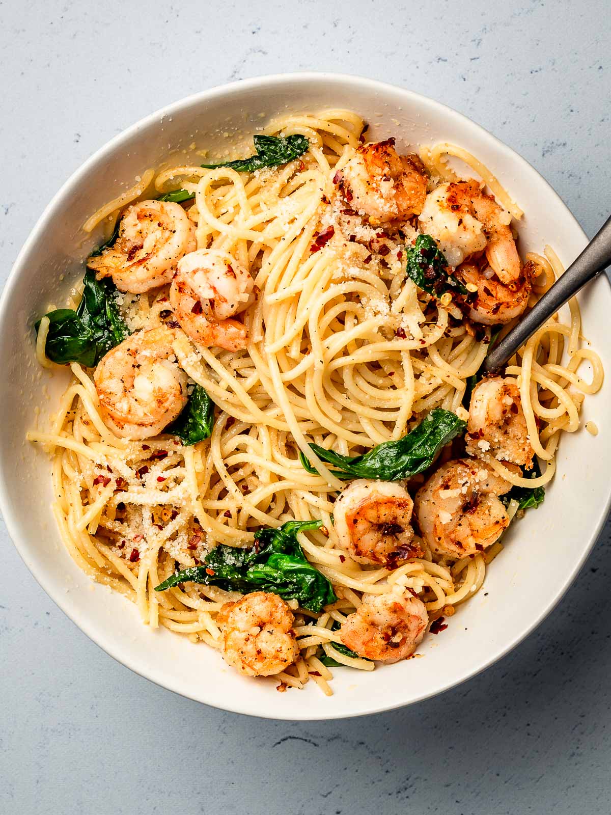 Pasta with garlic butter shrimp in a bowl.