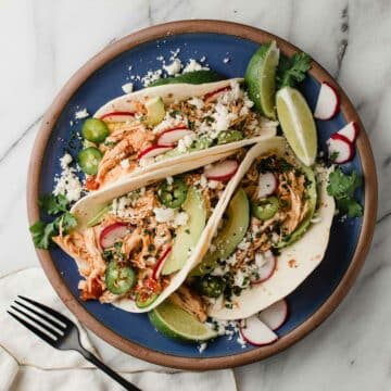 Instant Pot Chicken Tacos on a plate.